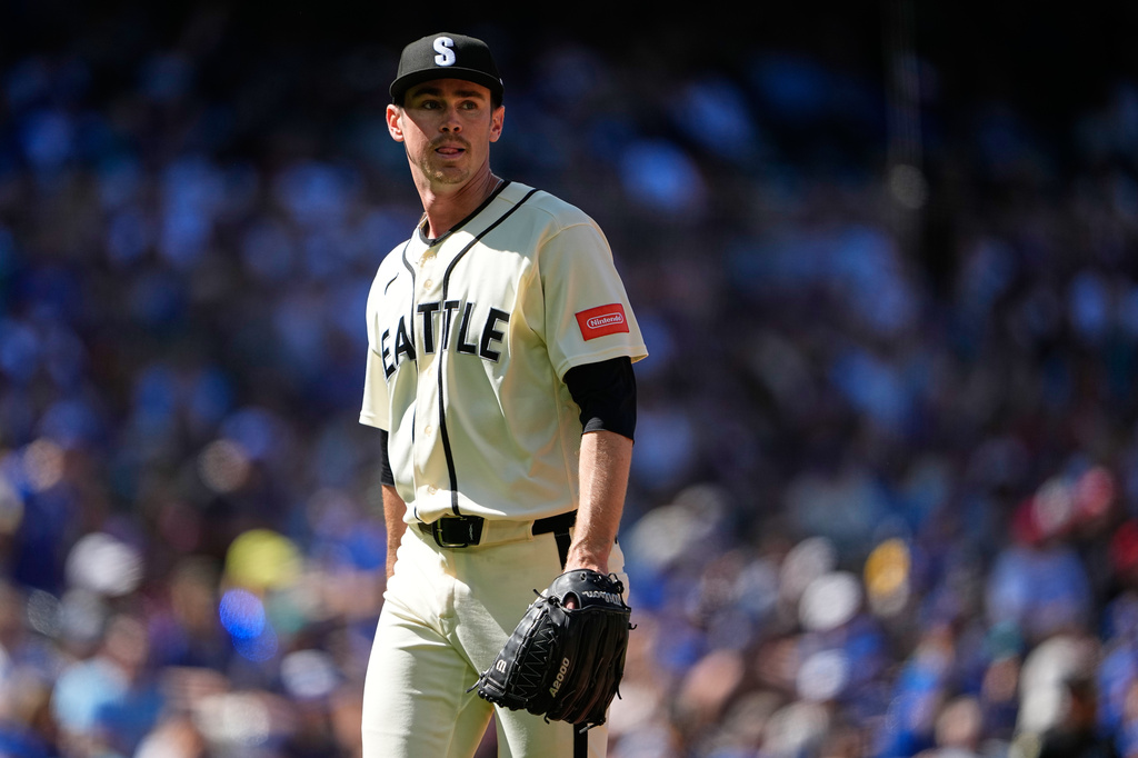 Seattle Mariners starting pitcher Emerson Hancock walks back to the dugout after the seventh inning against the Toronto Blue Jays during a baseball game, Sunday, July 5, 2026, in Seattle. (AP Photo/Lindsey Wasson)