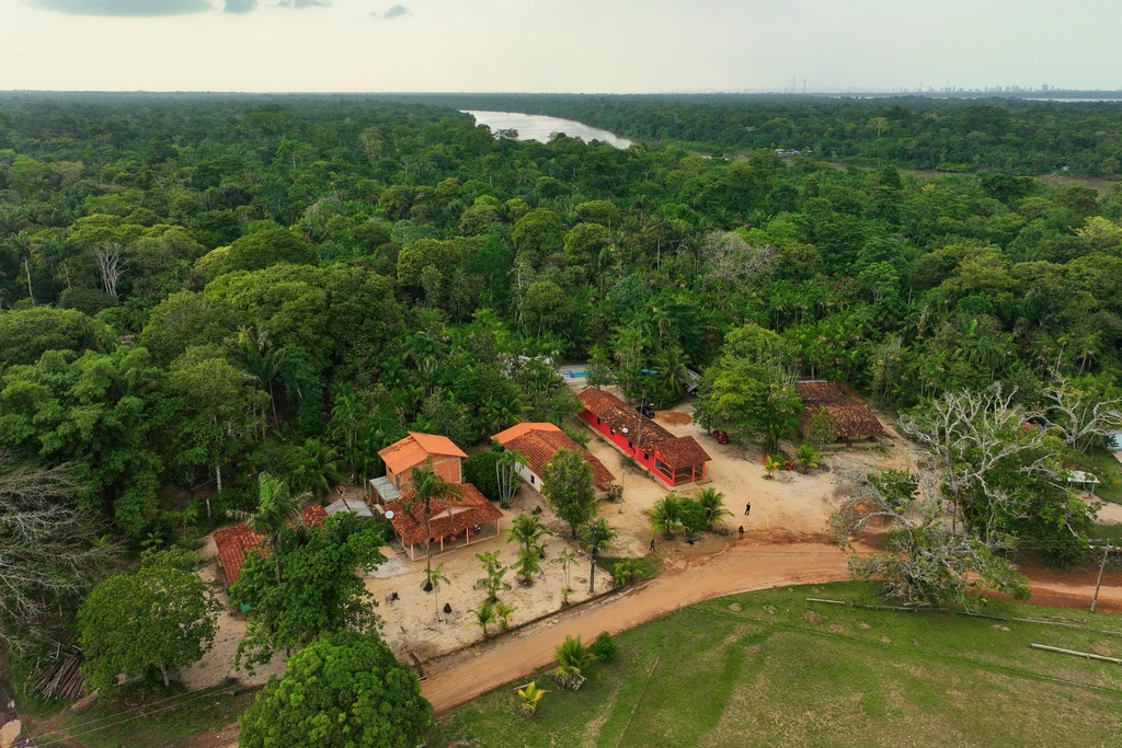 Houses at a quilombola, an Afro-descendant community called Menino Jesus, are visible in Acara, Brazil, Tuesday, Nov. 18, 2025. (AP Photo/Fernando Llano)