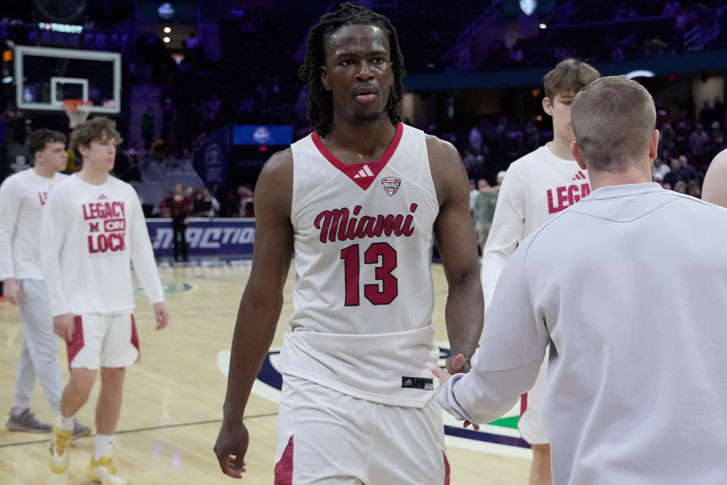 Miami (Ohio) forward Antwone Woolfolk (13) was off the court after Miami (Ohio) was defeated by Massachusetts in a basketball game in the quarterfinals of the Mid-American Conference tournament, Thursday, March 12, 2026, in Cleveland. (AP Photo/Sue Ogrocki)
