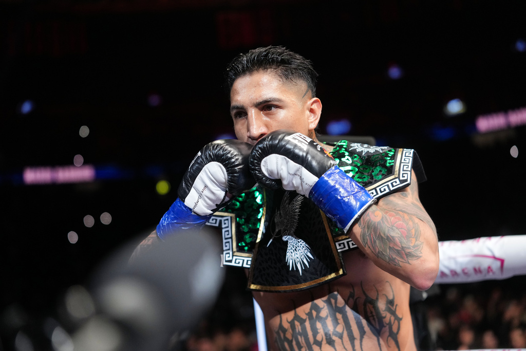 Mario Barrios arrives to fight in a WBC welterweight title boxing match against Ryan Garcia Saturday, Feb. 21, 2026, in Las Vegas. (AP Photo/Lucas Peltier)