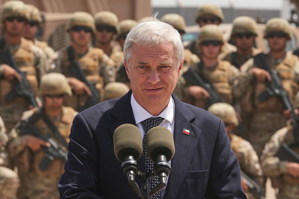 Chilean President Jose Antonio Kast gives a press conference at the military base "Solo de Zaldivar," near the Chacalluta border crossing, in Arica, Chile, Monday, March 16, 2026, after signing a decree to deter irregular migration along the northern border with Peru and Bolivia. (AP Photo/Esteban Felix)