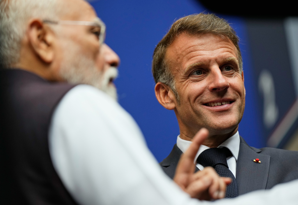 Indian Prime Minister Narendra Modi, left, and French President Emmanuel Macron attend an Indian education and ecosystem event in Nice, southern France, Sunday, June 14, 2026. (AP Photo/Lewis Joly, Pool)