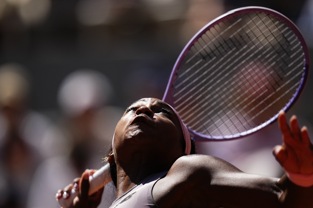 Coco Gauff of the U.S. serves to Taylor Townsend of the U.S. during their first round women's singles tennis match at the French Open tennis tournament in Paris, Tuesday, May 26, 2026. (AP Photo/Christophe Ena)
