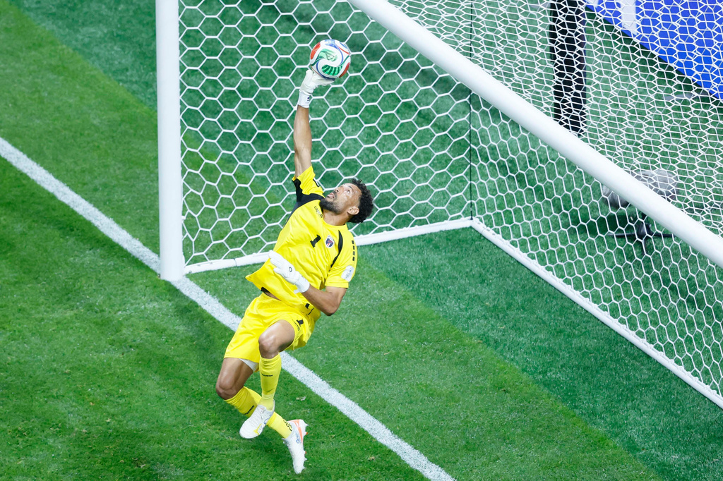 Cape Verde goalkeeper Vozinha (1) makes a save during the World Cup Group H soccer match between Spain and Cape Verde in Atlanta, Monday, June 15, 2026. (Miguel Martinez/Atlanta Journal-Constitution via AP)