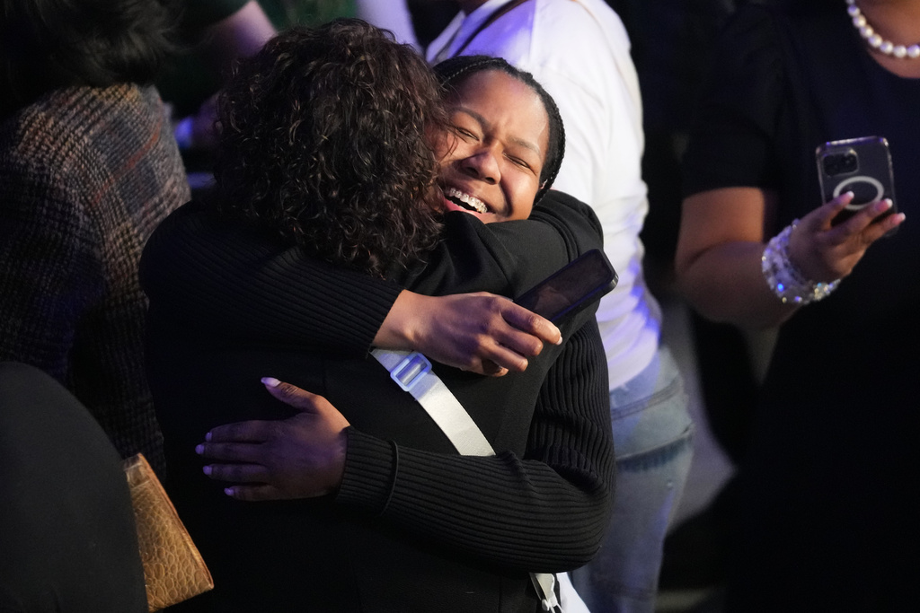 Supporters react as election results roll in during a primary election night watch party for Illinois Lt. Gov. Juliana Stratton, a Democratic candidate for U.S. Senate Tuesday, March 17, 2026, in Chicago. (AP Photo/Erin Hooley)