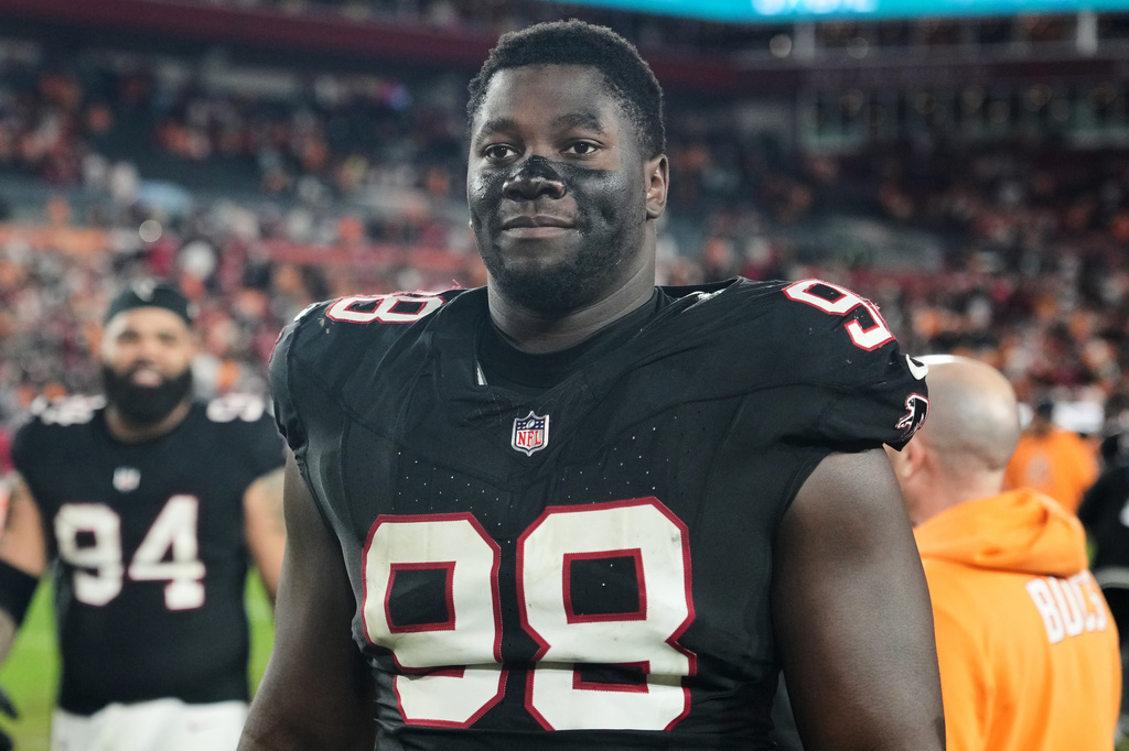 FILE - Atlanta Falcons defensive tackle Ruke Orhorhoro (98) leaves the field following an NFL football game against the Tampa Bay Buccaneers, Thursday, Dec 11, 2025, in Tampa, Fla. (AP Photo/Peter Joneleit, File)