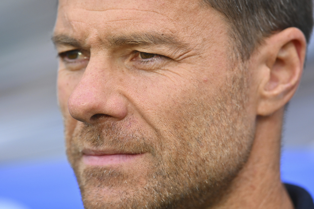 Real Madrid head coach Xabi Alonso waits for the start of the La Liga soccer match between Real Sociedad and Real Madrid at the Reale Arena in San Sebastian, Spain, Saturday, Sept. 13, 2025. (AP Photo/Miguel Oses)