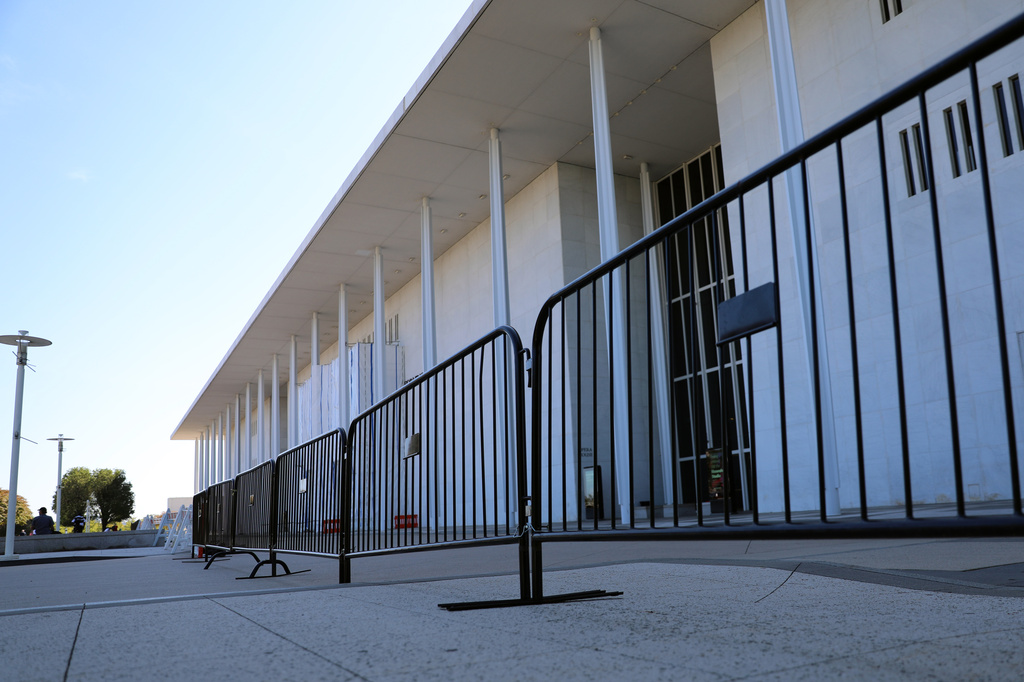 Fencing is installed at the John F. Kennedy Center for the Performing Arts, Wednesday, Sept. 16, 2026, in Washington. (AP Photo/Rahmat Gul)