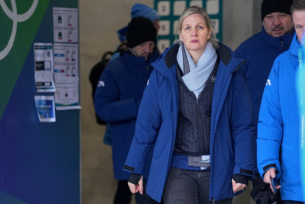 International Olympic Committee President Kirsty Coventry leaves the start house of the sliding center at the 2026 Winter Olympics, in Cortina d'Ampezzo, Italy, Thursday, Feb. 12, 2026. (AP Photo/Fatima Shbair)
