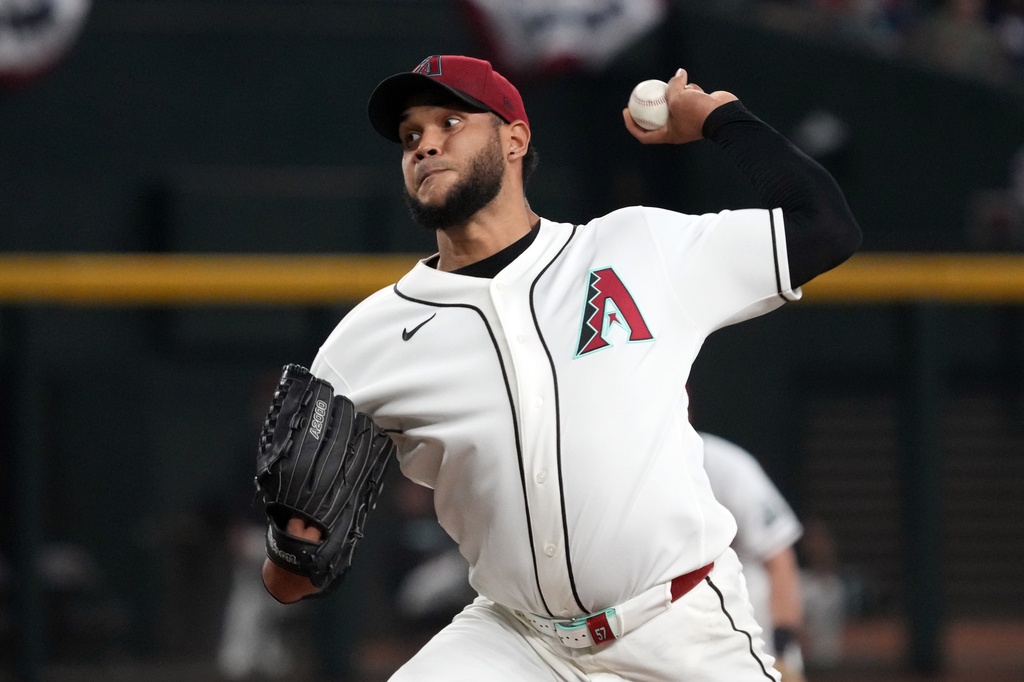 Arizona Diamondbacks pitcher Eduardo Rodriguez throws against the Milwaukee Brewers in the first inning of a baseball game, Sunday, July 5, 2026, in Phoenix. (AP Photo/Rick Scuteri)