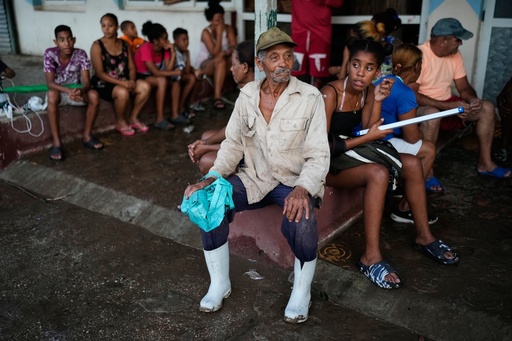 People wait to charge electrical appliances in El Cobre, Cuba, Wednesday, Oct. 29, 2025, in the aftermath of Hurricane Melissa. (AP Photo/Ramon Espinosa) People wait to charge electrical appliances in El Cobre, Cuba, Wednesday, Oct. 29, 2025, in the aftermath of Hurricane Melissa. (AP Photo/Ramon Espinosa)