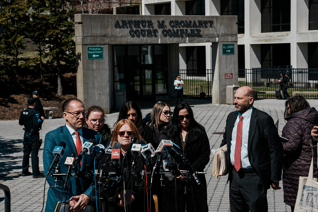 Asa Ellerup, wife, of Rex Heuermann gives her statement outside the courthouse as Rex Heuermann, accused in Long Island's infamous Gilgo Beach serial killings, pleaded guilty on Wednesday, April 8, 2026, at Suffolk County Court in Riverhead, New York. (AP Photo/Eduardo Munoz Alvarez)