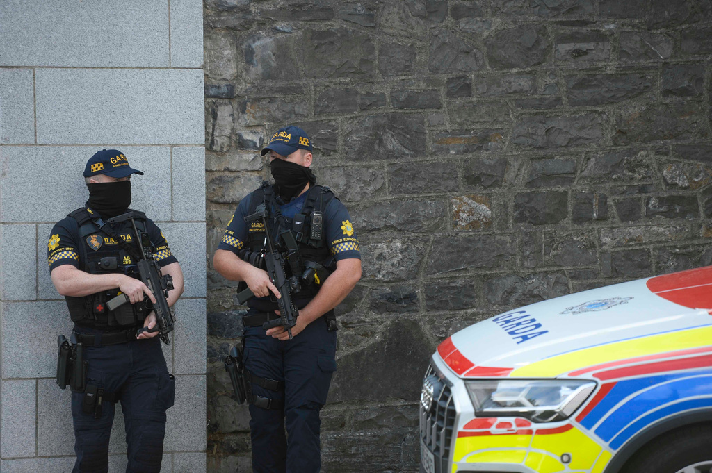 Members of the Garda Armed response unit at the Central Criminal Court in Dublin, Sunday, Aug. 9, 2026, where Daniel Kinahan is expected to appear charged with directing an organised crime group, after being extradited from Dubai. (Mark Marlow/PA via AP)