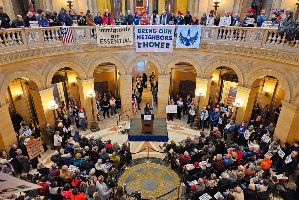 Hundreds of people attend a rally in the rotunda of the Minnesota State Capitol in St. Paul, Minn., Wednesday, Feb. 18, 2026, to urge leaders to support economic recovery in the wake of the Trump administration's immigration crackdown in the state. (AP Photo/Steve Karnowski)