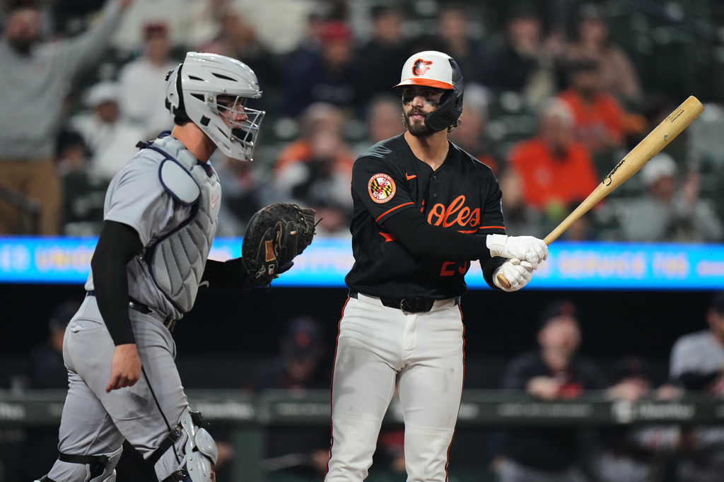 Baltimore Orioles' Blaze Alexander, right, reacts after striking out on a foul tip during the ninth inning in the second baseball game of a doubleheader against the Detroit Tigers, Sunday, May 24, 2026, in Baltimore. (AP Photo/Stephanie Scarbrough)