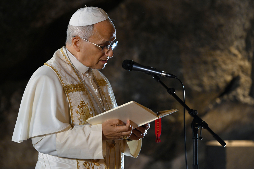 In this handout photo provided by Vatican Media Pope Leo XIV leads a prayer at the Grotto of the Apparitions of Massabielle, in Lourdes, France, Saturday, Sept. 26, 2026. (Vatican Media via AP)