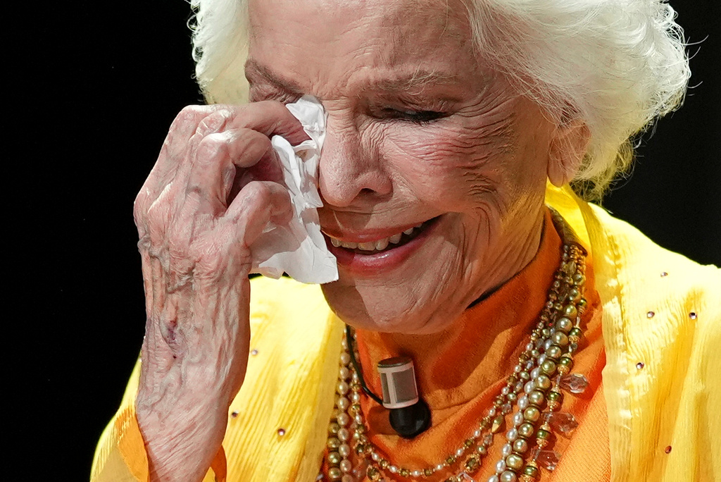 Ellen Burstyn wipes a tear from her eye after receiving the golden lion for lifetime achievement during the 83rd edition of the Venice Film Festival in in Venice, Italy, on Monday, Sept. 7, 2026. (Photo by Scott A Garfitt/Invision/AP)