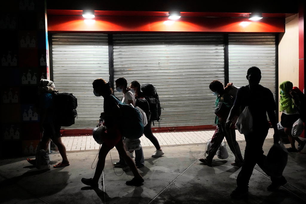 FILE - Migrants arrive in Panama City, March 8, 2025. (AP Photo/Matias Delacroix, File)