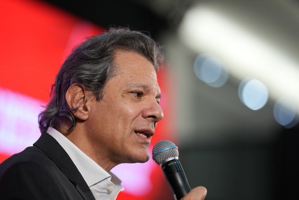 Outgoing Finance Minister Fernando Haddad speaks at a ceremony announcing his candidacy for governor of Sao Paulo state in the October elections, in Sao Bernardo do Campo, Brazil, Thursday, March 19, 2026. (AP Photo/Andre Penner)