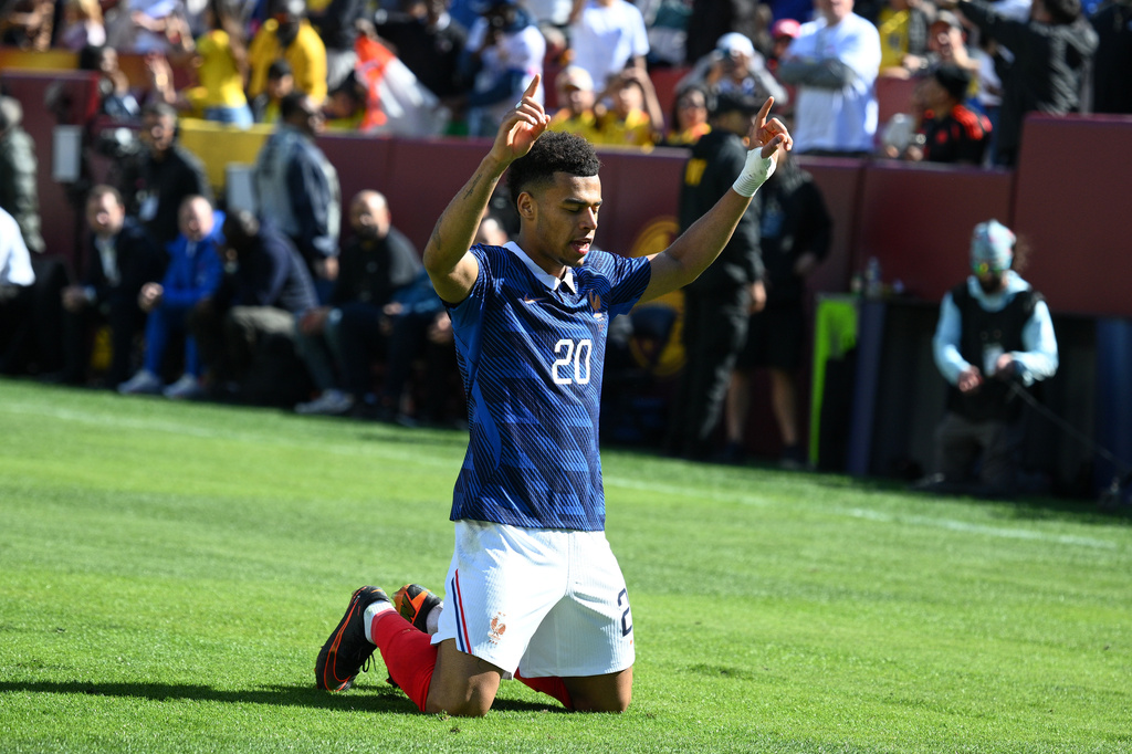 France forward Désiré Doué (20) celebrates after scoring the opening goal during the international friendly soccer match between Colombia and France in Landover, Md., Sunday, March 29, 2026. (AP Photo/Nick Wass)