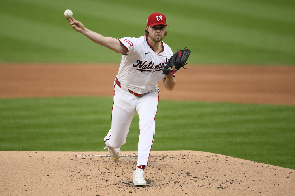 Washington Nationals starting pitcher Jake Irvin (27) throws during the second inning of the first baseball game of a doubleheader against the Atlanta Braves, Tuesday, Sept. 16, 2025, in Washington. (AP Photo/Nick Wass)