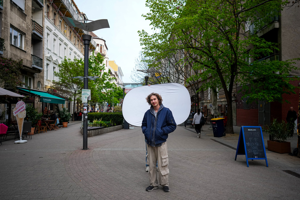 Vincent Nelson, 20, poses for a portrait in Budapest, Hungary, Monday, April 13, 2026. "We didn't like what we were seeing and had to do something about it." (AP Photo/Petr David Josek)