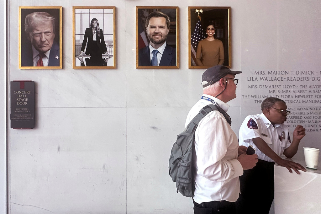 Portraits of President Donald Trump, from left, first lady Melania Trump, Vice President JD Vance and second lady Usha Vance are displayed on the walls of the The John F. Kennedy Center for the Performing Arts lobby, Friday, June 5, 2026, in Washington. (AP Photo/Manuel Balce Ceneta)