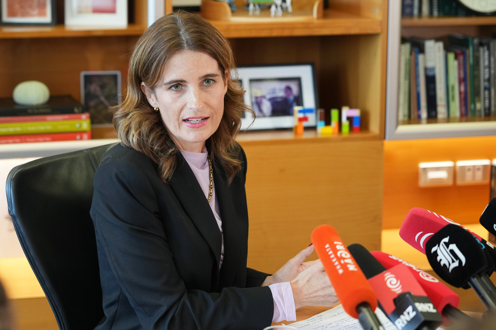FILE - New Zealand Finance Minister, Nicola Willis, holds a press conference in her office at Parliament in Wellington, New Zealand, March 16, 2026. (AP Photo/Charlotte Graham-McLay, File)