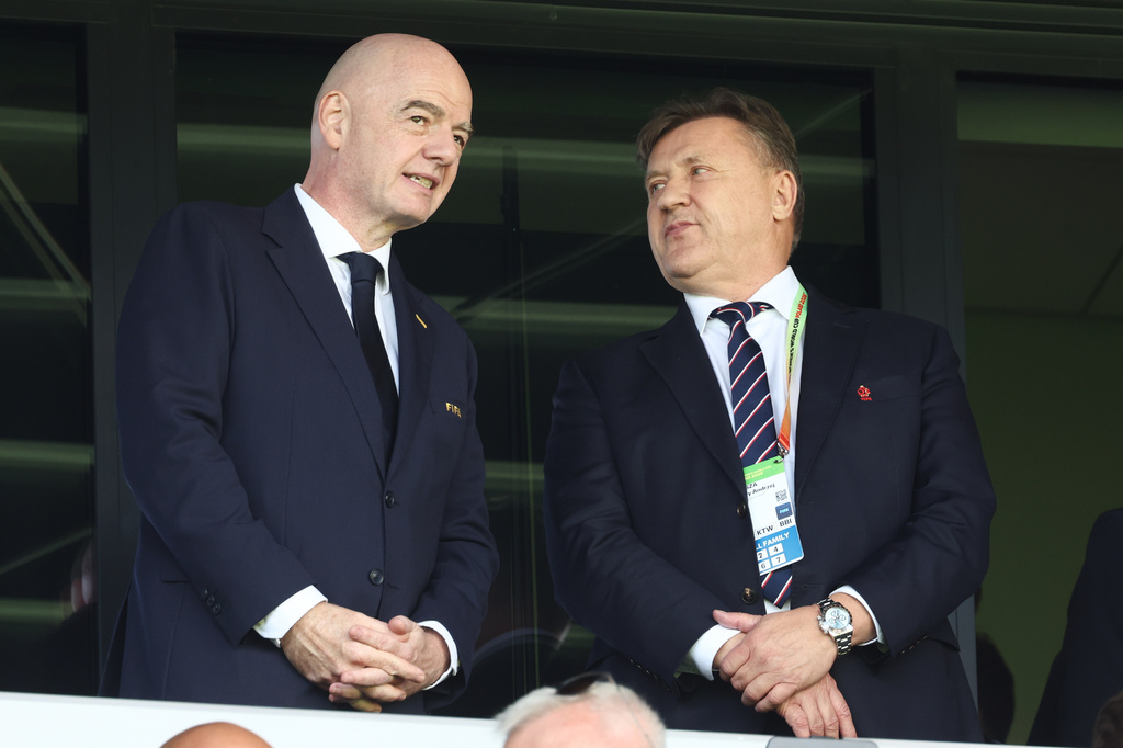 FIFA President Gianni Infantino, left, and President of Polish Football Association Cezary Kulesza attend the opening game of the Women's U20 World Cup opening match between Poland and Argentina in Katowice, Poland, Saturday, Sept. 5, 2026. (AP Photo/Beata Zawrzel) CORRECTION: Corrects spelling of name to Kulesza not Kuleza