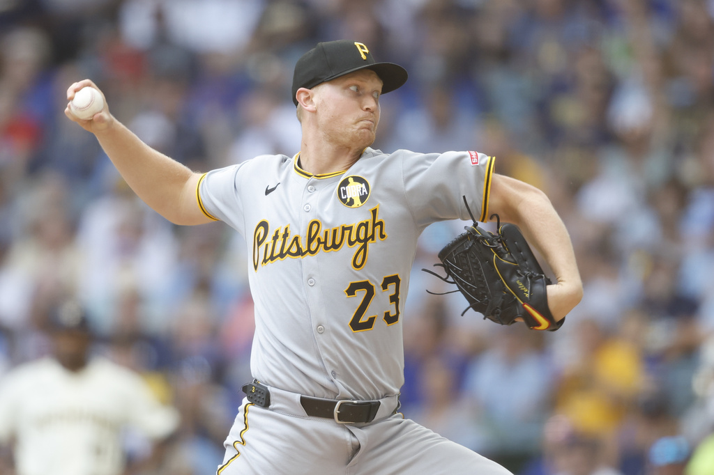Pittsburgh Pirates pitcher Mitch Keller (23) throws to the Milwaukee Brewers during the first inning of a baseball game, Wednesday, Aug. 13, 2025, in Milwaukee. (AP Photo/Jeffrey Phelps)