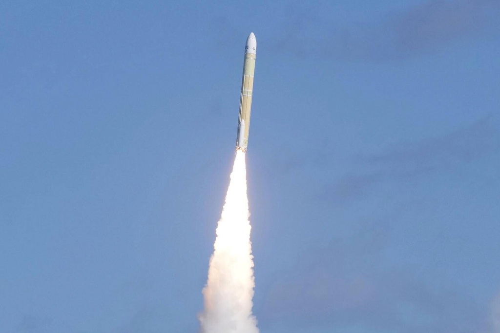 The H3 rocket (8th) by the Japan Aerospace Exploration Agency (JAXA), carrying a navigation satellite, is launched from the Tanegashima Space Center in Minamitane, Tanegashima island, southern Japan Monday, Dec. 22, 2025. (Kyodo News via AP)