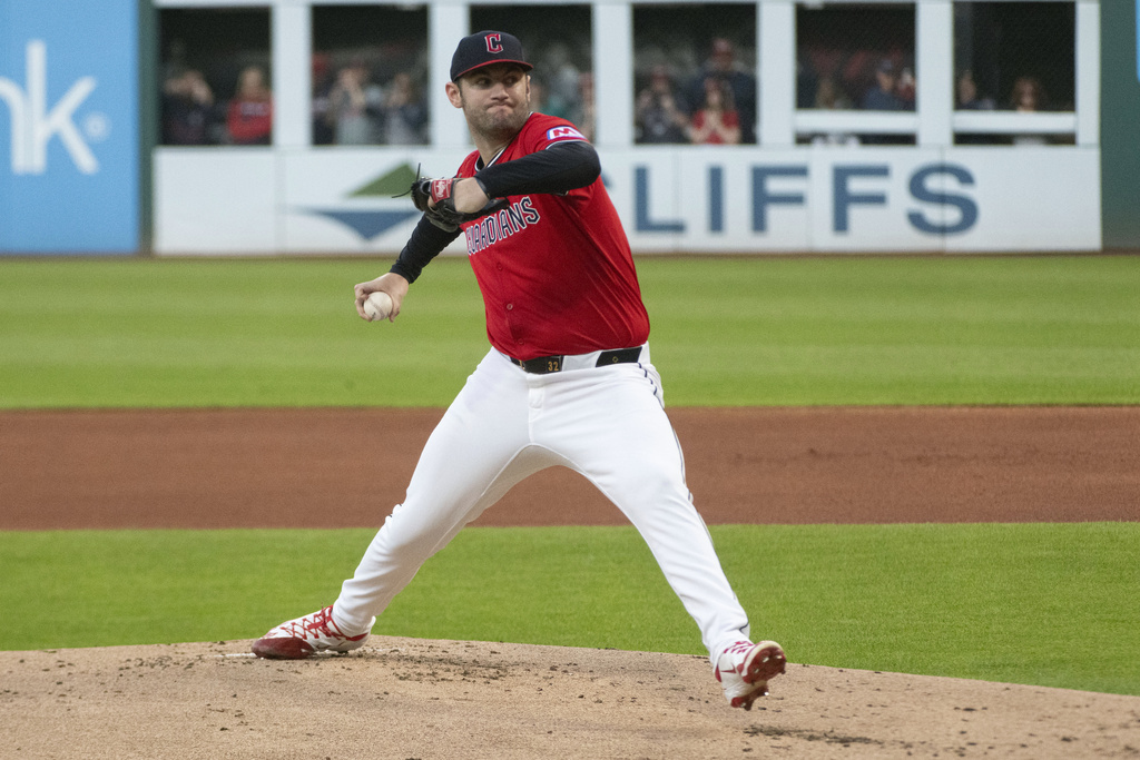 Cleveland Guardians starting pitcher Gavin Williams delivers against the Seattle Mariners during the first inning of a baseball game, Saturday, Aug. 30, 2025, in Cleveland. (AP Photo/Phil Long)