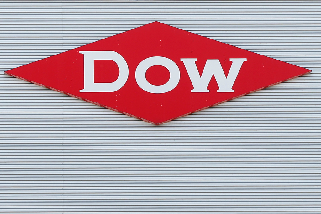FILE - The Dow corporate logo in Midland, Mich., Aug. 2, 2019. (AP Photo/Paul Sancya, File)