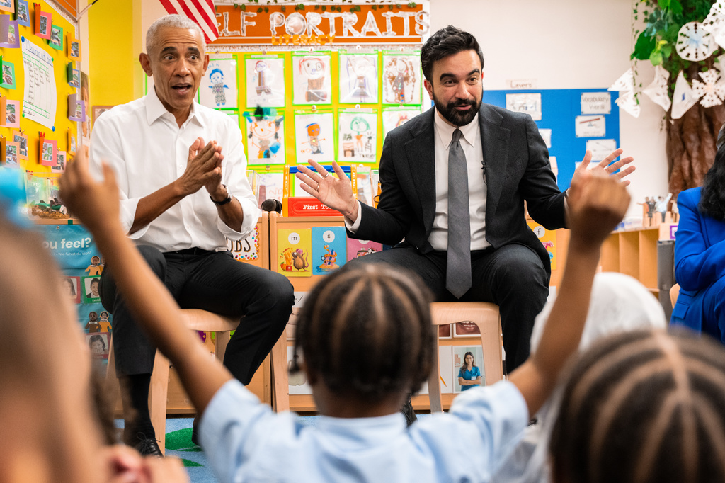 Former President Barack Obama and Mayor Zohran Mamdani sing "Wheels on the Bus" to children at Learning Through Play Pre-K in the Bronx in New York, Saturday, April 18, 2026. (AP Photo/Angelina Katsanis)