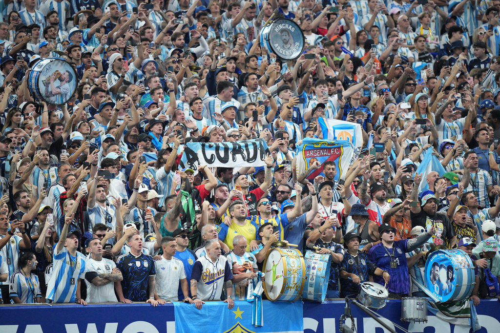 Argentina fans cheer during the World Cup round of 16 soccer match between Argentina and Egypt in Atlanta, Tuesday, July 7, 2026. (AP Photo/Jacob Kupferman)