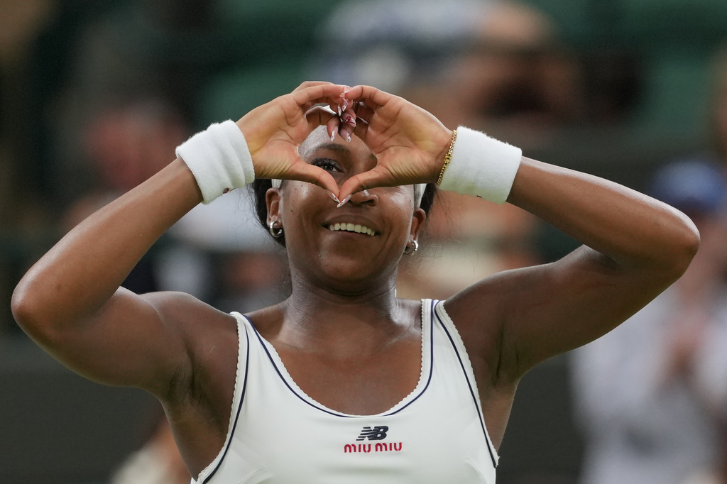 Coco Gauff of the United States reacts after winning against Belinda Bencic of Switzerland in their fourth round women's singles match at the Wimbledon Tennis Championships in London, Sunday, July 5, 2026. (AP Photo/Kin Cheung)