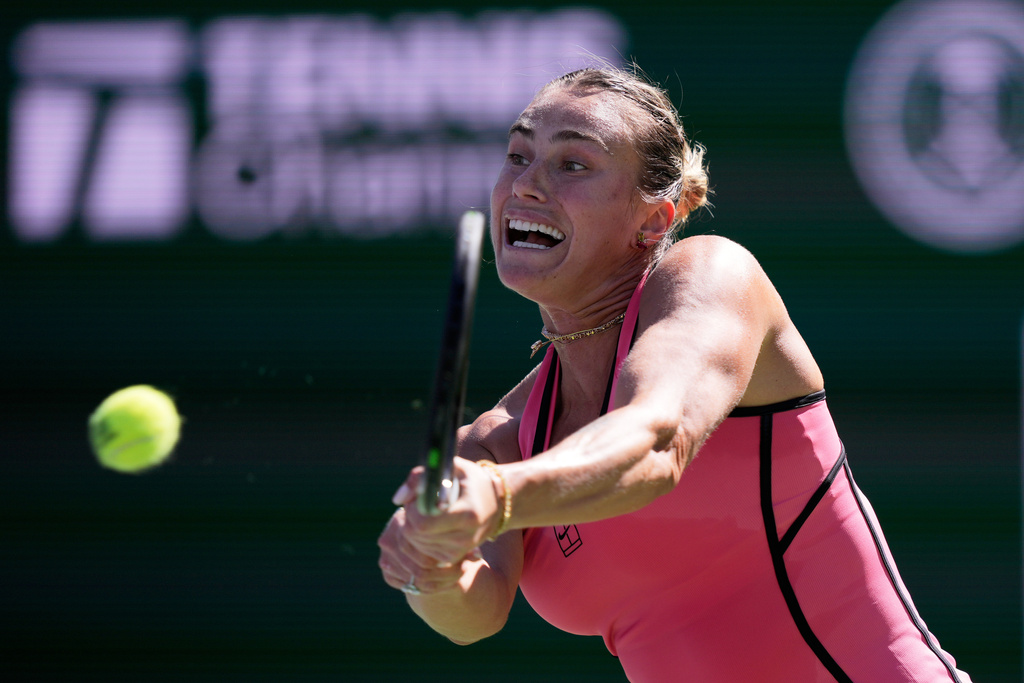 Aryna Sabalenka, of Belarus, returns a shot against Victoria Mboko, of Canada, during a quarterfinal match at the BNP Paribas Open tennis tournament, Thursday, March 12, 2026, in Indian Wells, Calif. (AP Photo/Mark J. Terrill)