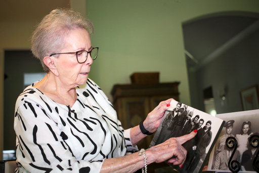 June West Brandt, 93, holds a photo displaying her brother, William Durham West Jr., who was killed in World War II, Aug. 27, 2025, in Richmond, Texas. (AP Photo/Lekan Oyekanmi) June West Brandt, 93, holds a photo displaying her brother, William Durham West Jr., who was killed in World War II, Aug. 27, 2025, in Richmond, Texas. (AP Photo/Lekan Oyekanmi)