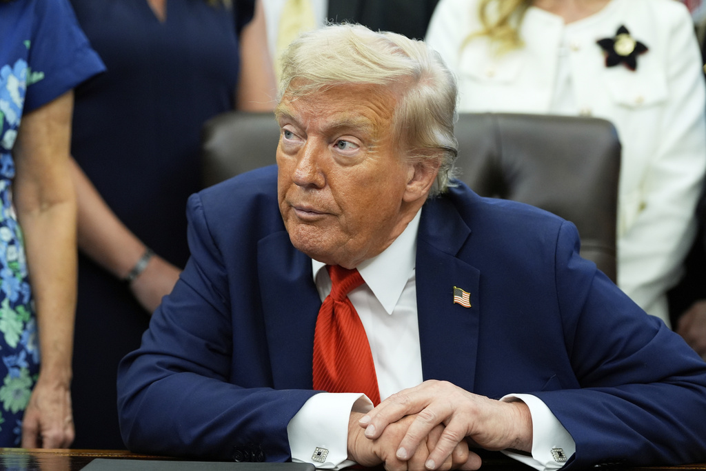 President Donald Trump speaks during an event signing a proclamation honoring the fourth anniversary of the attack at Abbey Gate in Afghanistan, in the Oval Office of the White House, Monday, Aug. 25, 2025, in Washington. (AP Photo/Alex Brandon)