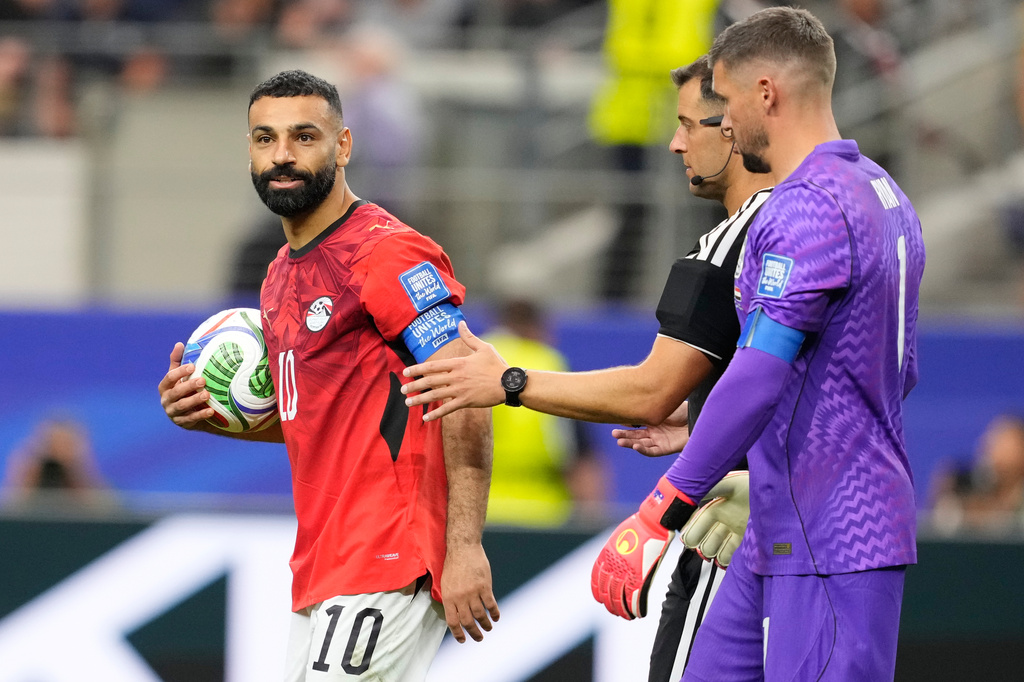 Egypt's Mohamed Salah reacts after scoring during a penalty shootout against Australia for the World Cup round of 32 soccer match in Arlington, Texas, near Dallas, Friday, July 3, 2026. (AP Photo/Tony Gutierrez)