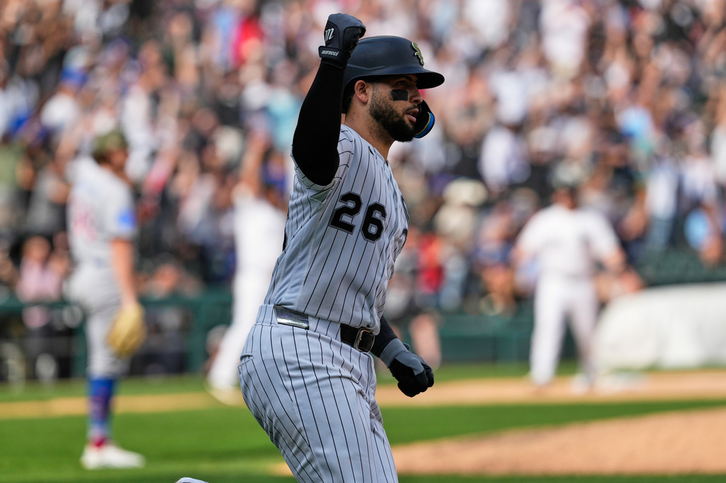 Chicago White Sox's Edgar Quero celebrates as he rounds the bases after hitting the winning two-run home run during the 10th inning of a baseball game against the Chicago Cubs in Chicago, Sunday, May 17, 2026. (AP Photo/Nam Y. Huh)
