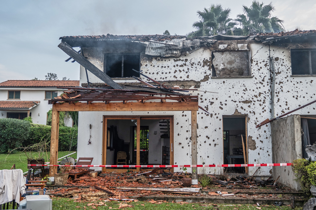 A house damaged by a drone strike in Goma, Democratic Republic of Congo, Wednesday, March 11, 2026. (AP Photo/Moses Sawasawa)