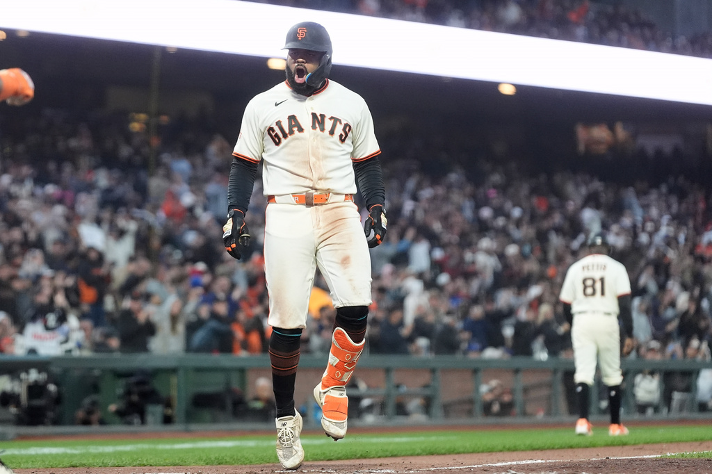 San Francisco Giants' Heliot Ramos reacts after hitting a three-run home during the sixth inning of a baseball game against the Toronto Blue Jays Monday, July 6, 2026, in San Francisco. (AP Photo/Jeff Chiu)