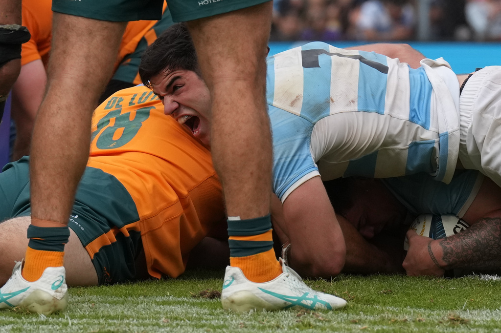 Argentina's Benjamin Grondona celebrates after teammate Boris Wenger scored a try against Australia during a rugby test match in Jujuy, Argentina, Saturday, Aug. 29, 2026. (AP Photo/Gustavo Garello)