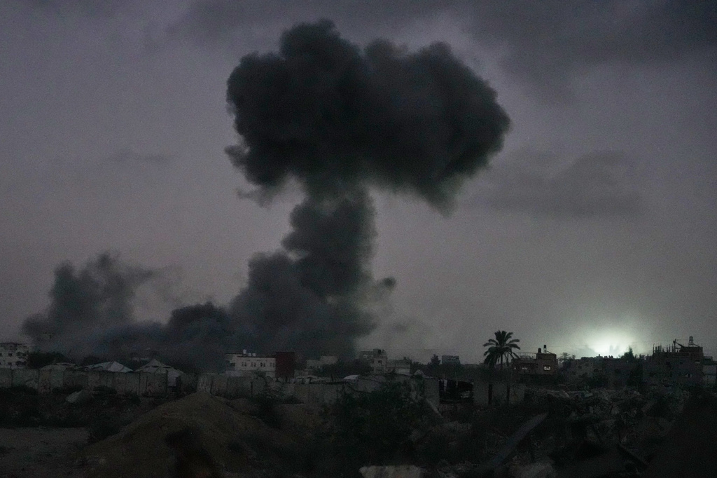 Smoke rises to the sky following an Israeli military strike in Maghazi refugee camp, in the central Gaza Strip, Wednesday, July 15, 2026. (AP Photo/Abdel Kareem Hana)