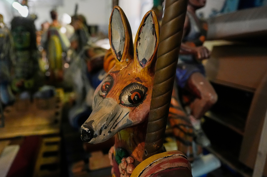 A figure of Mr. Fox Trot from the Fox Trot Carousel is seen in a state government storage facility Wednesday, June 24, 2026, in Nashville, Tenn. (AP Photo/George Walker IV)