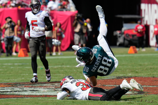 Philadelphia Eagles tight end Dallas Goedert (88) is taken down by Tampa Bay Buccaneers safety Antoine Winfield Jr. (31) after a catch during the first half of an NFL football game Sunday, Sept. 28, 2025, in Tampa, Fla. (AP Photo/Chris O'Meara) Philadelphia Eagles tight end Dallas Goedert (88) is taken down by Tampa Bay Buccaneers safety Antoine Winfield Jr. (31) after a catch during the first half of an NFL football game Sunday, Sept. 28, 2025, in Tampa, Fla. (AP Photo/Chris O'Meara)