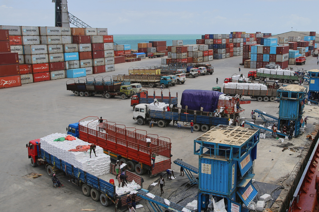 Workers load cargo at the port in Mogadishu, Somalia, Sunday, Sept. 13, 2026. (AP Photo/Farah Abdi Warsameh)