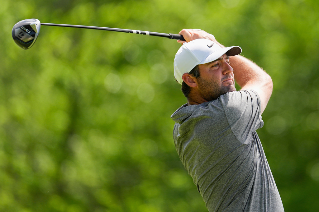 Scottie Scheffler hits from the second tee during the final round of the PGA Championship golf tournament at Aronimink Golf Club, Sunday, May 17, 2026, in Newtown Square, PA. (AP Photo/Carolyn Kaster)