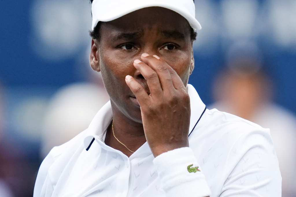 Venus Williams reacts while playing against Kamilla Rakhimova during the National Bank Open tennis tournament in Toronto, Sunday, Aug. 2, 2026. (Chris Young/The Canadian Press via AP)